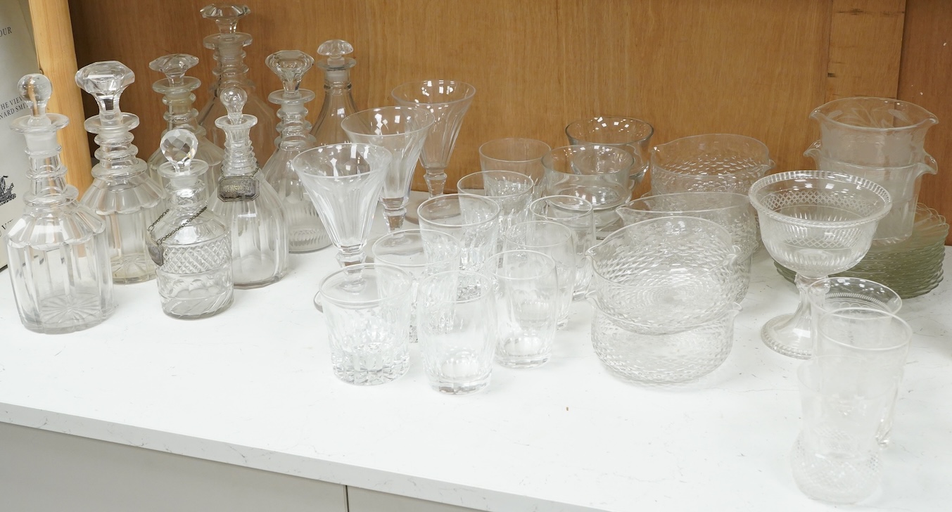 A collection of 19th century and later glassware, to include: Three fluted wine glasses two rummers, various risers and finger bows, decanters etc